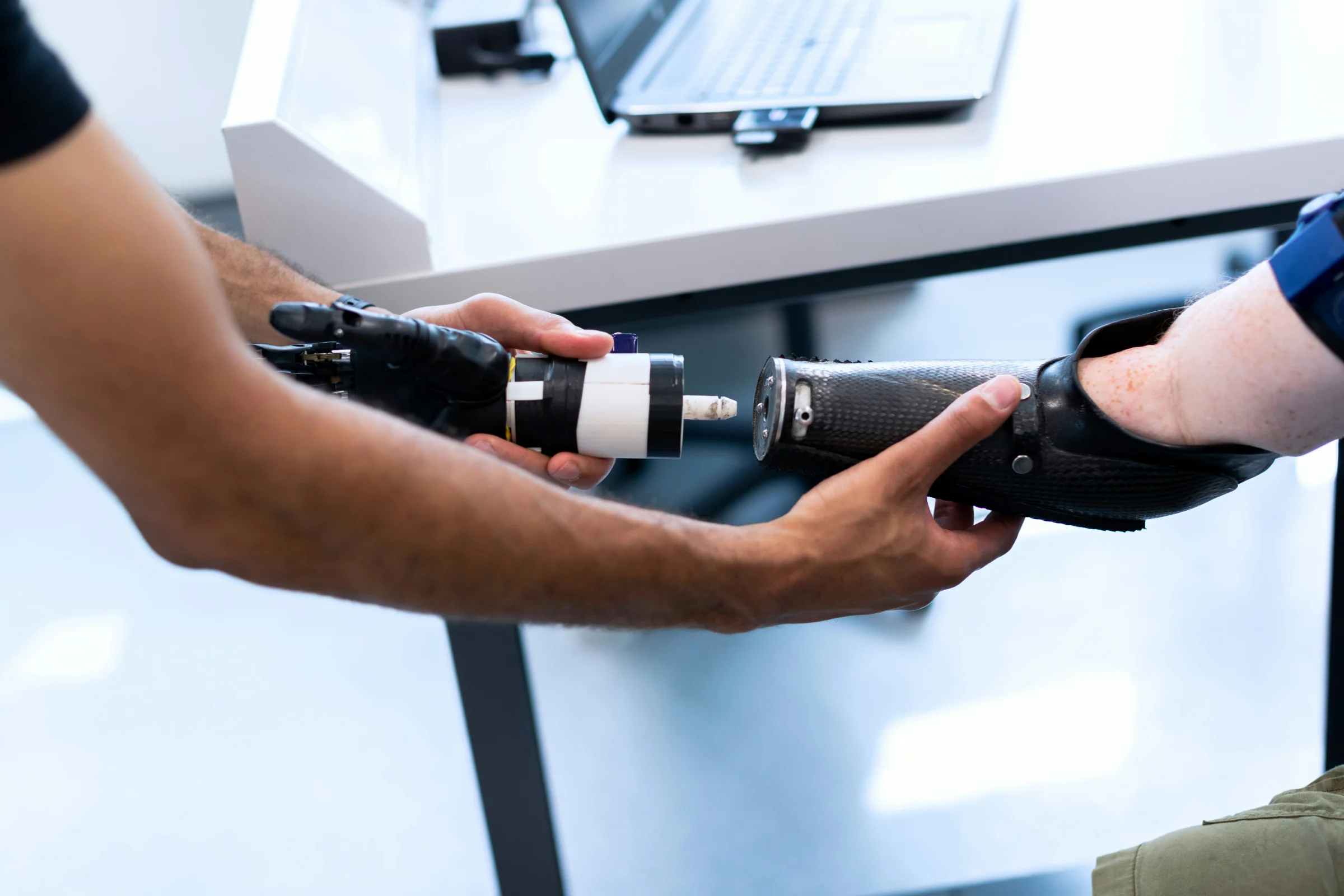 Connecting robotic prosthetic arm components.